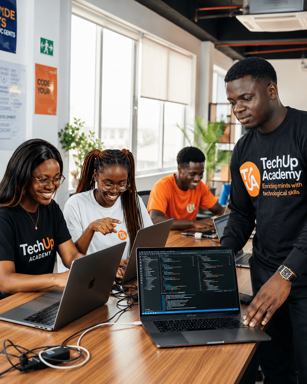 TechUp Academy students in the hero section