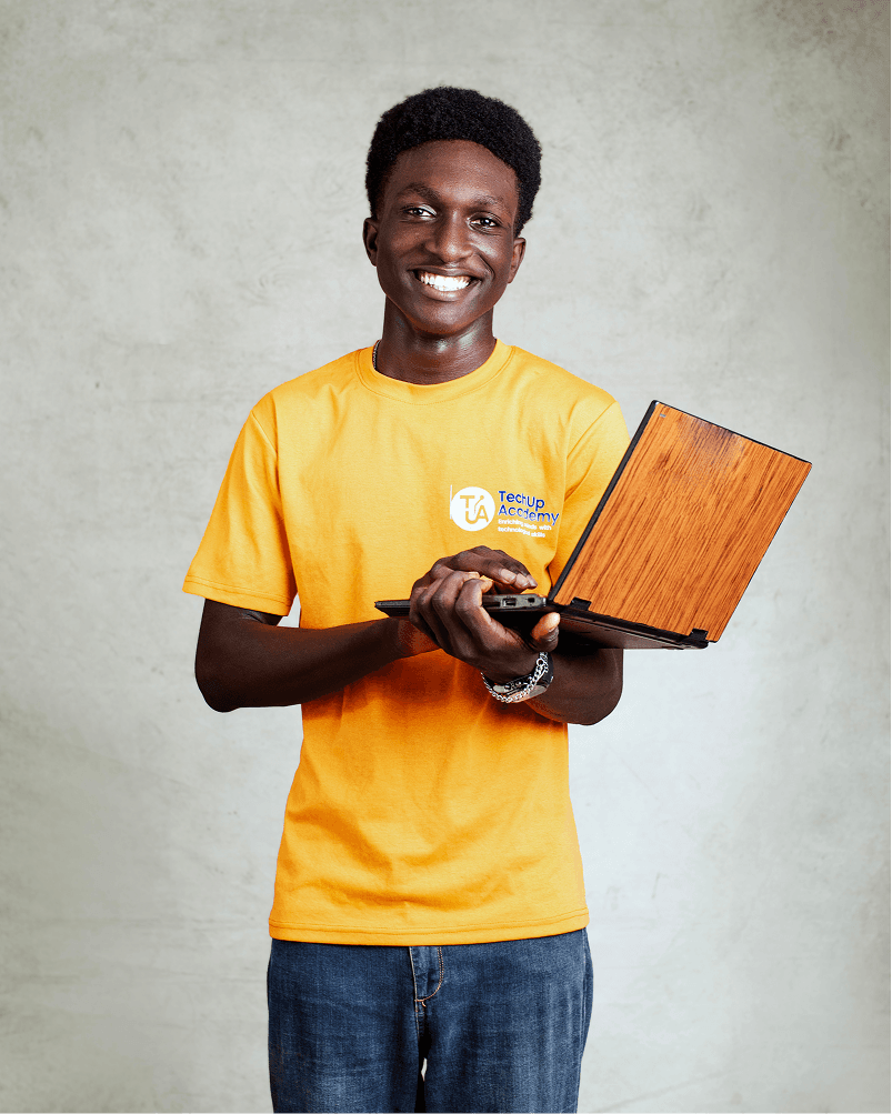 Scholarship applicant holding a laptop